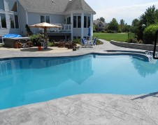 Create Your Own Summer Staycation Oasis With A Resurfaced Pool Deck