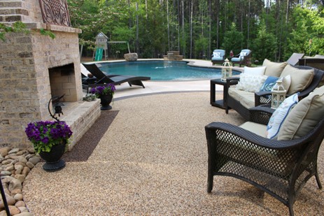 decorative-concrete-river-rock-overlay-pool-deck.jpg
