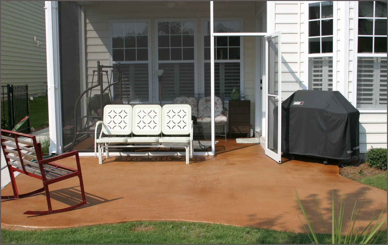 Stained Concrete Patio With Furniture