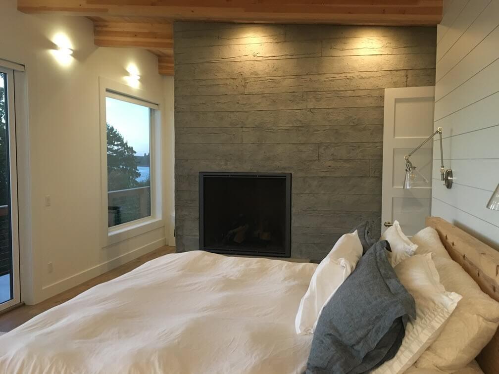wood-plank-vertical-concrete-overlay-fireplace