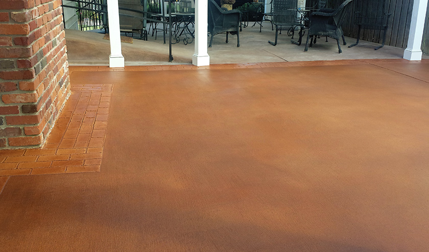 Resurfaced_Broom-Finish-Overlay_Stain_Patio_with-border